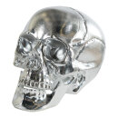 Skull made of plastic shiny - Material:  - Color: silver...